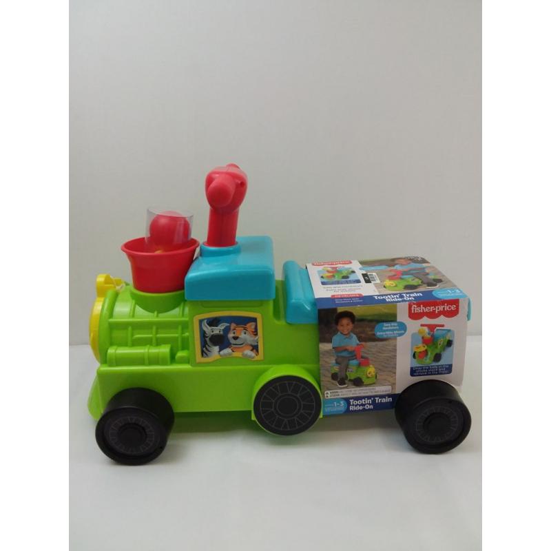 Fisher-Price Tootin' Train Ride-On - Green