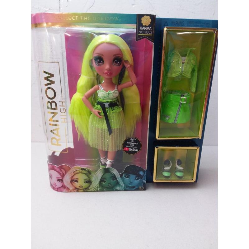 Rainbow High Karma Nichols – Fashion Doll with 2 Complete Mix & Match Outfits