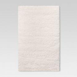 4'x5'6 Cream Plush Shag Washable Accent Rug - Room Essentials