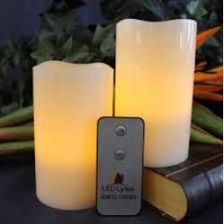 LED Lytes Flameless Candles, Battery Powered Candle Set, 2 Ivory Wax Amber Yellow Flickering Flame Pillars with Remote for Weddings, Parties and Gifts